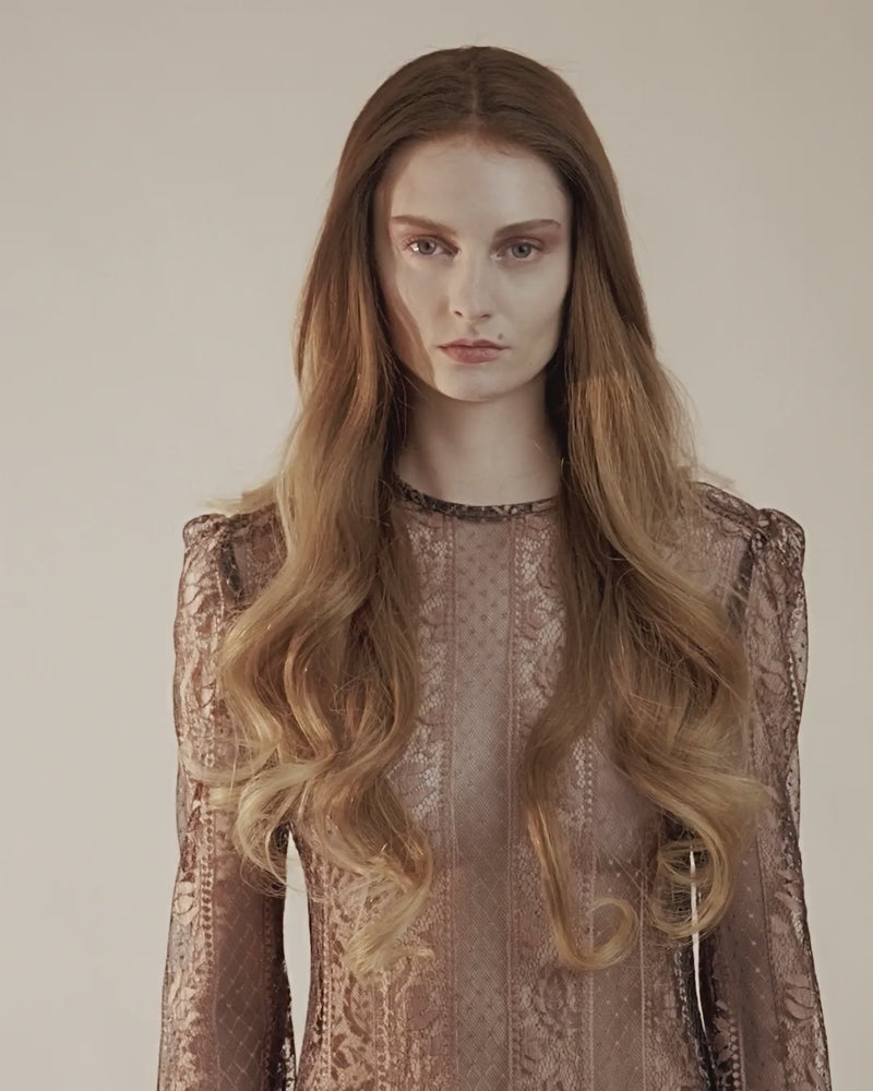 Video of neutral light brown Provenir topper with long soft curls on model