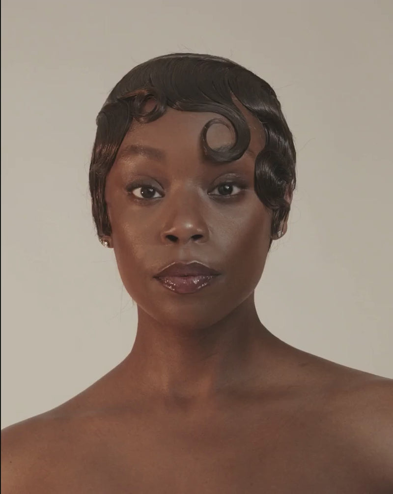 Video showing Provenir 1N darkest brown hairpiece styled in short finger waves
